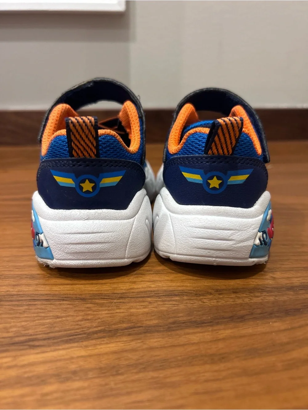 Skechers Kids Blue and Orange Airplane sneakers